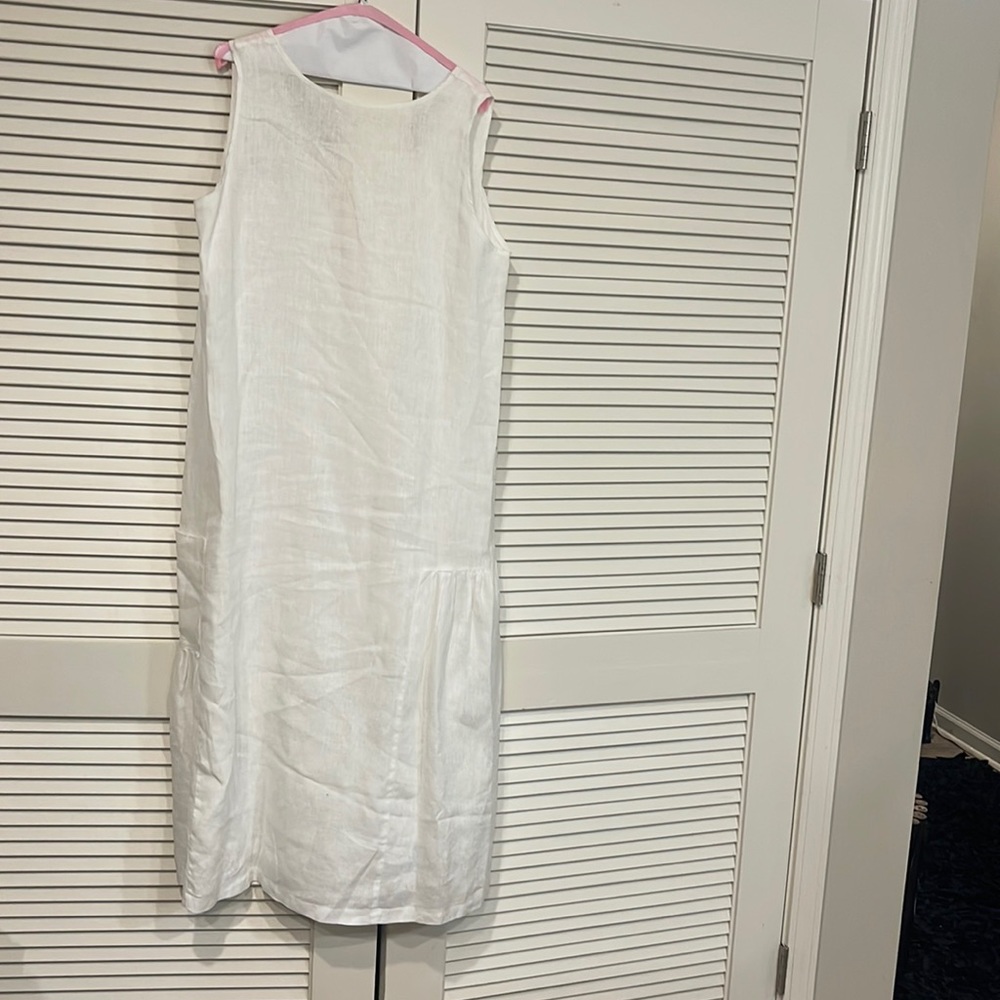 Long white linen flowing dress with side pockets